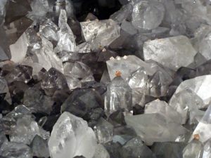 Smoky quartz with pink fluorite in the Kristallkluft Gerstenegg alpine crystal cleft near Grimsel Pass, Switzerland