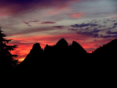 Sunset above peaks at the Green Ridge claim, Snoqualmie River Middlefork in the Cascades, Washington