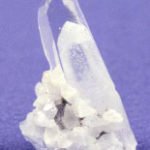 Quartz crystal with phantom and minor calcite